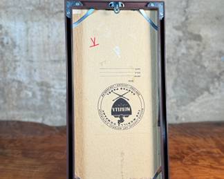 This lot features a vintage original oil on board painting depicting Jesus Christ. This work measures in frame, 16” H x 8” W.