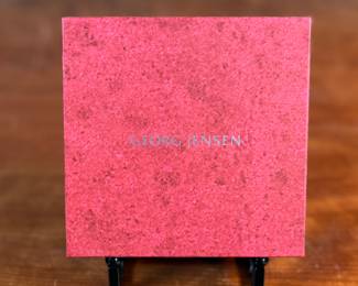 This lot features an iconic sterling silver hearts bracelet, a delightful classic design by Danish modernist Karl-Gustav Hansen for Hans Hansen, made in Denmark circa 1950s. Karl Gustav Hansen was the son Hans Hansen and later merged with the Georg Jensen company. This bracelet has the Hans Hansen designed screw-down clasp lock, measures 7” with a total approx. weight of 28.80 grams. Maker mark present as shown in photos.