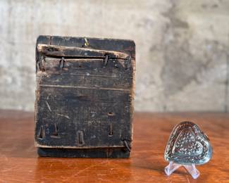 This lot features an antique wooden heart mold and a copper heart!