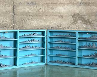 This lot features a complete set of WWII U.S. Navy recognition ship models in their original, self-contained wooden display case. These sets were manufactured by H.A. Framburg & Co. for the U.S. Navy Bureau of Aeronautics to help personnel identify friendly and enemy vessels during the war. This set measures (closed), 18.5” H x 36.5” W x 6.75” D. These models are generally considered 1/1200 scale, and were used as identification and training aids for the Navy during World War II.