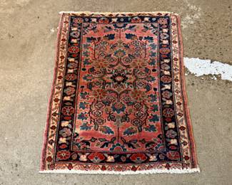 This lot features a Persian Sarouk rug that measures, 32” H x 22.5” W.