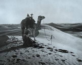 “Arab Desert Scenes”, three professionally framed silver gelatin prints by listed photographers, Rudolf Franz Lehnert & Ernst Heinrich Landrock. Measures in frame, 10” H x 30” W. Rudolf Franz Lehnert (1878-1948) and Ernst Heinrich Landrock (1880-1957), a renowned photographic team of the early 20th century, known for their Orientalist images, often featuring desert scenes with camels and local inhabitants, distributed as original prints, photogravures, and postcards.