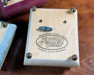 This lot features three (3) music boxes, all manufactured by The San Francisco Music Box Company. All three are in good overall condition with maker mark present underneath as shown in photos.