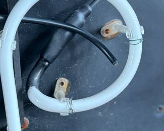 “Smoke Shop”, a vintage neon sign that measures, 20” H x 31” W. This sign appears to be in good overall condition, but is missing the plug to test.