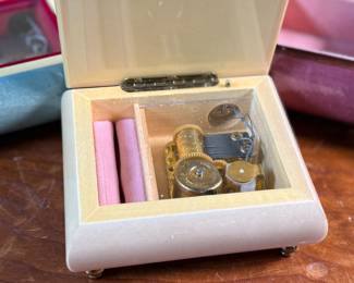 This lot features three (3) music boxes, all manufactured by The San Francisco Music Box Company. All three are in good overall condition with maker mark present underneath as shown in photos.