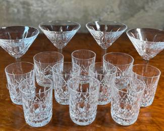 This lot features a wonderful collection of fourteen (14) pieces of Waterford Crystal. All pieces bear the maker mark underneath as shown in photos and appear to be in very good condition.