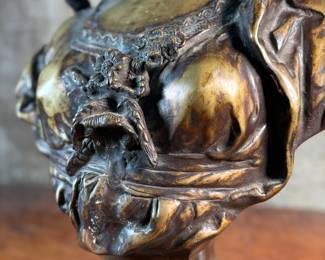 This lot features a large bronze bust depicting Marianne of France. Hollow inside as shown in photos, but quite heavy and well-made. This sculpture measures, 26” H x 16” W x 8” D.