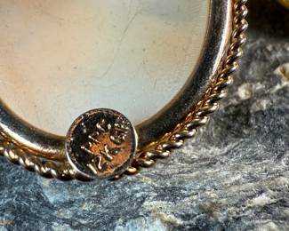 This lot features a pair of antique gold cameos. One is marked 12K gold-fill and the smaller one does not have any visible markings. Total approx. weight for both cameos is 7.00 grams.