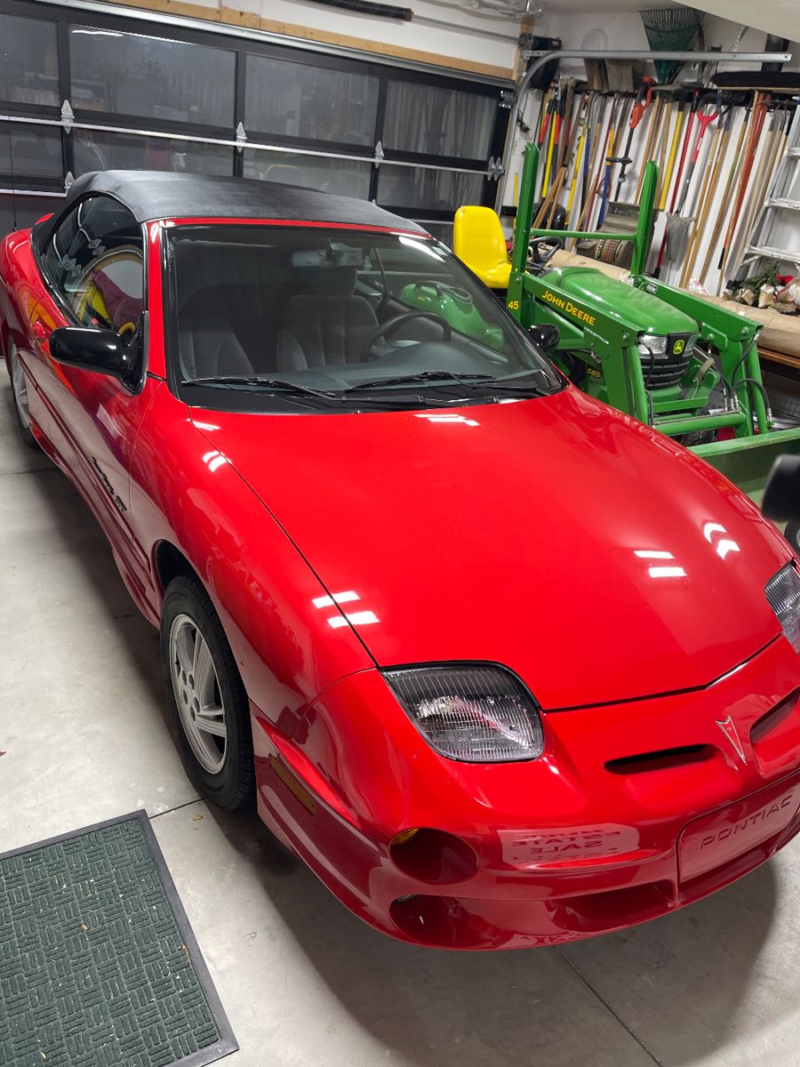 Photo taken offsite, items behind car are not part of the sale. 