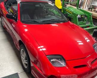 Photo taken offsite, items behind car are not part of the sale.