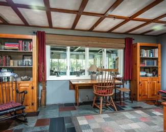 bookcases and desk with leaf
