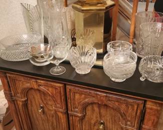 Buffet cabinet (the top does not lift open), plus many pieces of crystal