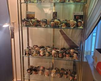 There are many Royal Doulton Toby Mugs.... Plus a lit Brass/glass curio cabinet