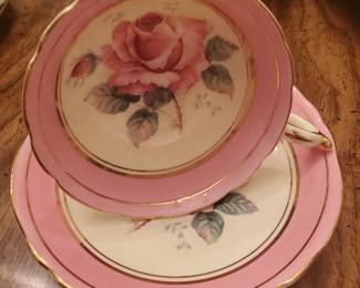 There is a generous amount of gorgeous tea cup sets for possibly a wedding or a lavish tea party.