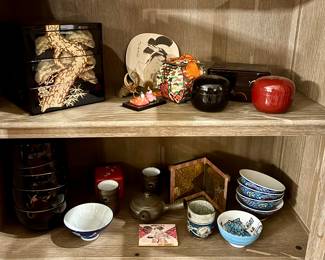 Unique Collection of Authentic and Original Artistry and HeritageDécor from Japan
✨ Lacquerware & Decorative Boxes
• black lacquer jubako (stacked food box) with intricate gold pine and bamboo design
• red and black lacquer containers
• traditional lidded boxes & multi-tier black lacquer bowl set
✨ Traditional Decorative Pieces
• Japanese fan print featuring a classic portrait
• kimono-style fabric ornament
• Miniature Hina Matsuri (doll festival) display
• Gold-leaf folding screen
✨ Ceramics & Tea Items
• Set of patterned bowls
• Matching hand-painted fish design bowl
• teapot (kyūsu) with side handle
• Assorted yunomi tea cups,
• ceramic containers