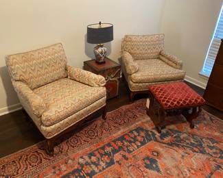 Pair of lounge chairs, mahogany footstool, storage end table, lamp