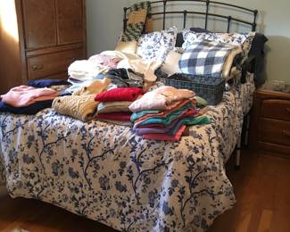 Full size bed
Tall dresser doors open w/ shelves inside drawers at bottom