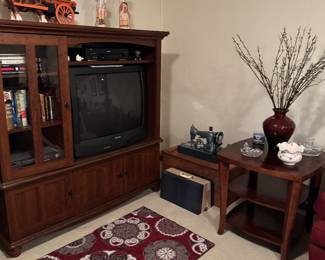 Entertainment center only $25
Horse drawn wagon with coal 
Sewing machine 