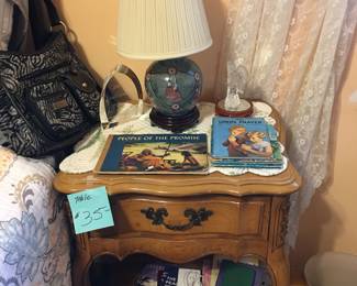 Night stand 
Lamp
Books