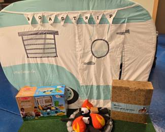 Camper playhouse by Asweets, comes with matching campfire and a camp stove and fire set by Melissa and Doug. Gently played with. 