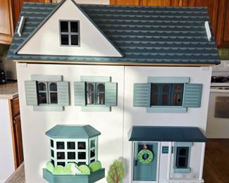 Large dollhouse by Tender Leaf Toys, filled with furnishings.  Never played with, displayed only briefly. (See next photos for interior.)