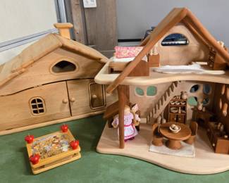 Two beautiful handmade Waldorf dollhouses. Left: Witch's Cottage by Drewart of Poland. Right: Fairy Dollhouse by a Michigan toymaker, with matching furniture and doll. A gorgeous house, see next photo for more detail. Both new and unplayed with. 