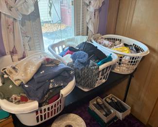 ladies clothes, 20-30 at lease of those holiday sweaters, look brand new. pressed ansd stored perfectly. I believe they are Croft and & Barrow.