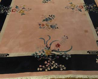Large Chinese pink colored rug