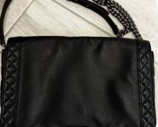 Authenticated CHANEL leather Extra Large
Reverso Boy Flap Bag with gun metal accents…PRISTINE!