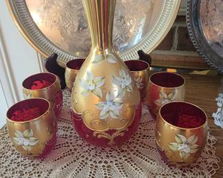 Rare Sergio Zane Cranberry Glass Murano Decanter set with 6 tumblers.  Hand painted raised floral design.  24K gold accents.