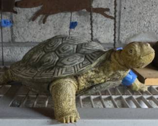 plastic turtle (back ground squirrel & fox, metal yard sticks)