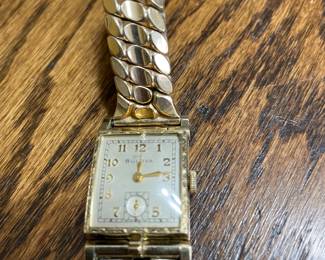 Bulova flip top hidden photo compartment watch. 10k rolled gold.