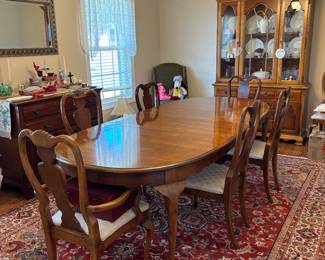 Beautiful formal dining table with 2 leafs and 6 chairs. Triple front china cabinet. China, crystal, side table/buffet, Beautiful area 8’x11’. Extra high back chairs. 