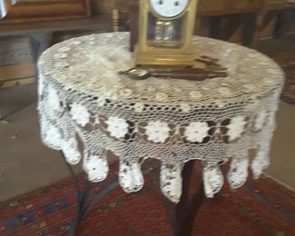Vintage brass & crystal clock on vintage hand crocheted table piece