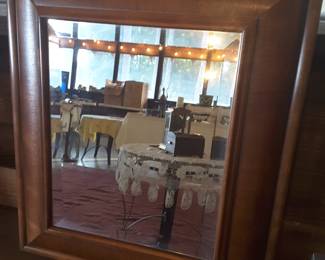 Beautiful beveled mirror in antique walnut frame