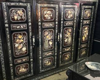 Abalone inlaid lacquered Asian wardrobe.