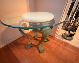 Wrought iron side table with glass top. Matches coffee table