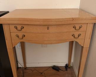 Vintage singer sewing machine in original cabinet