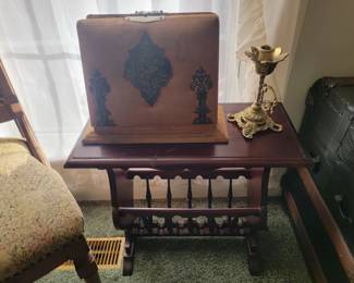 Magazine Rack with Antique Photo Album and Brass Candle Holder
