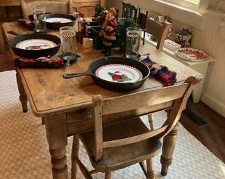Pine kitchen table, four antique chairs, Christmas dishes