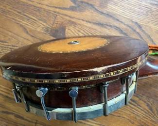 Antique banjo with inlay