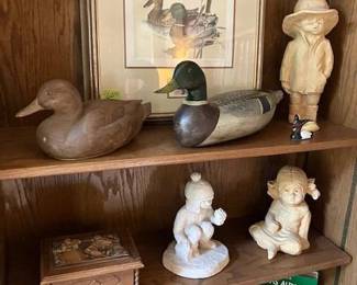 Duck carving, children figures.