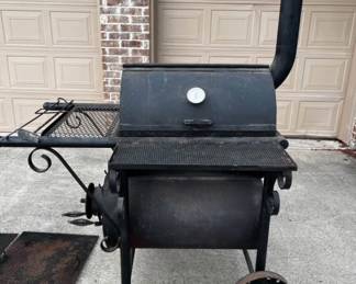 Wood burning double barrel smoker