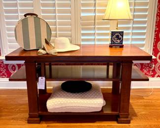 Many cute finds!  ($600 Frank Lloyd Wright hallway / console table by Copeland- 53 x 20 x 28.5), ($30 cable knit 100% wool made in Ireland throw), ($100 Foo Lion Dog tea caddy table lamp 22”)