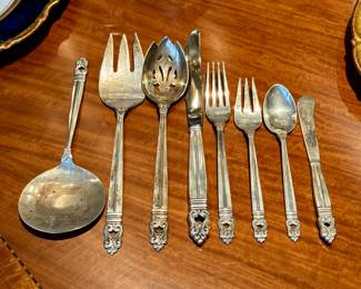 (Call to inquire for price. International Sterling “Royal Danish” silverware set- 8 knives, 7 butter, 8 salad, 6 dinner, 8 teaspoons, 8 misc: 2 vegetable, 1-6.5” spoon, 1 cocktail fork, 1 tong, 1 tomato, 1 meat, 1 slotted spoon- in original silver box)