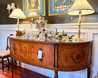 $1800 - Demi lune buffet with glass top with Burlwood inlay! Gorgeous! - 78x26x38; $100 (each)- Baldwin brass candlestick lamp with pleated shade (2 available)- 29h; $400 - Samavar coffee/tea urn - 19h; $30 - wine decanter; $30 - crystal decanter; $64 - stem wine glasses - set of 8; $550 - Thai temple rubbing warrior - 30x30; $550 - Thai Blue Dancers-30x30