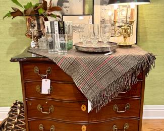 ($700 Bow Front 4 drawer chest - w/ glass top 39.5 x 22 x 34), ($300 Ralph Lauren cashmere throw made in Scotland, brand new 49 x 71), ($150 Baldwin 3 arm brass table lamp 24”), ($40 silver-plated footed serving tray 14”), ($120 silver-plated champagne ice bucket 11”), ($10 federal glass Windsor sugar/jam jar), ($2 each assorted University Club Chicago glass ware), ($20 pencil etching military soldier 17.5 x 21.5), ($250 James Swann etching “Chicago Harbour” 12 x 12), ($10 black and white photograph 17 x 22)
