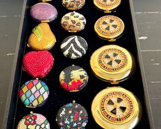 $80-150 - Prices range.  Call to inquire.  Vintage Estée Lauder compacts.  All new with boxes, bags, and replacement stones!