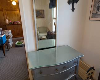 cute silver, glass-top dresser and mirror 