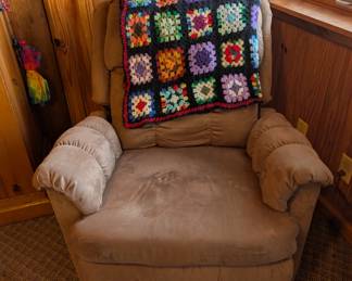Comfy tan recliner - crochet granny-square blanket